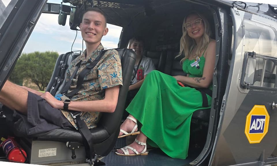 Nico beside a helicopter on his fundraising day